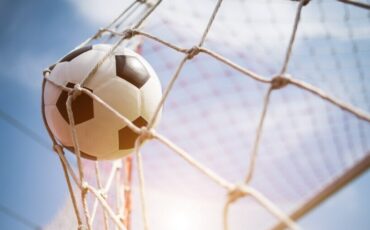 soccer into goal success concept 1150 5275 1 1